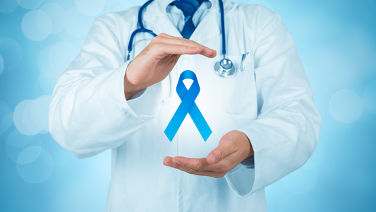 Doctor holding blue cancer awareness ribbon symbolizing cancer overview and awareness
