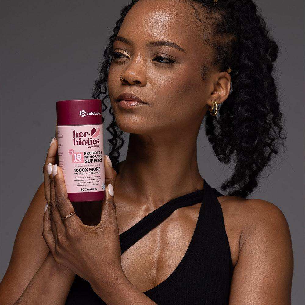 Her-Biotics Probiotics Menopause Support supplement bottle with herbal extracts for menopause symptom relief and bone health