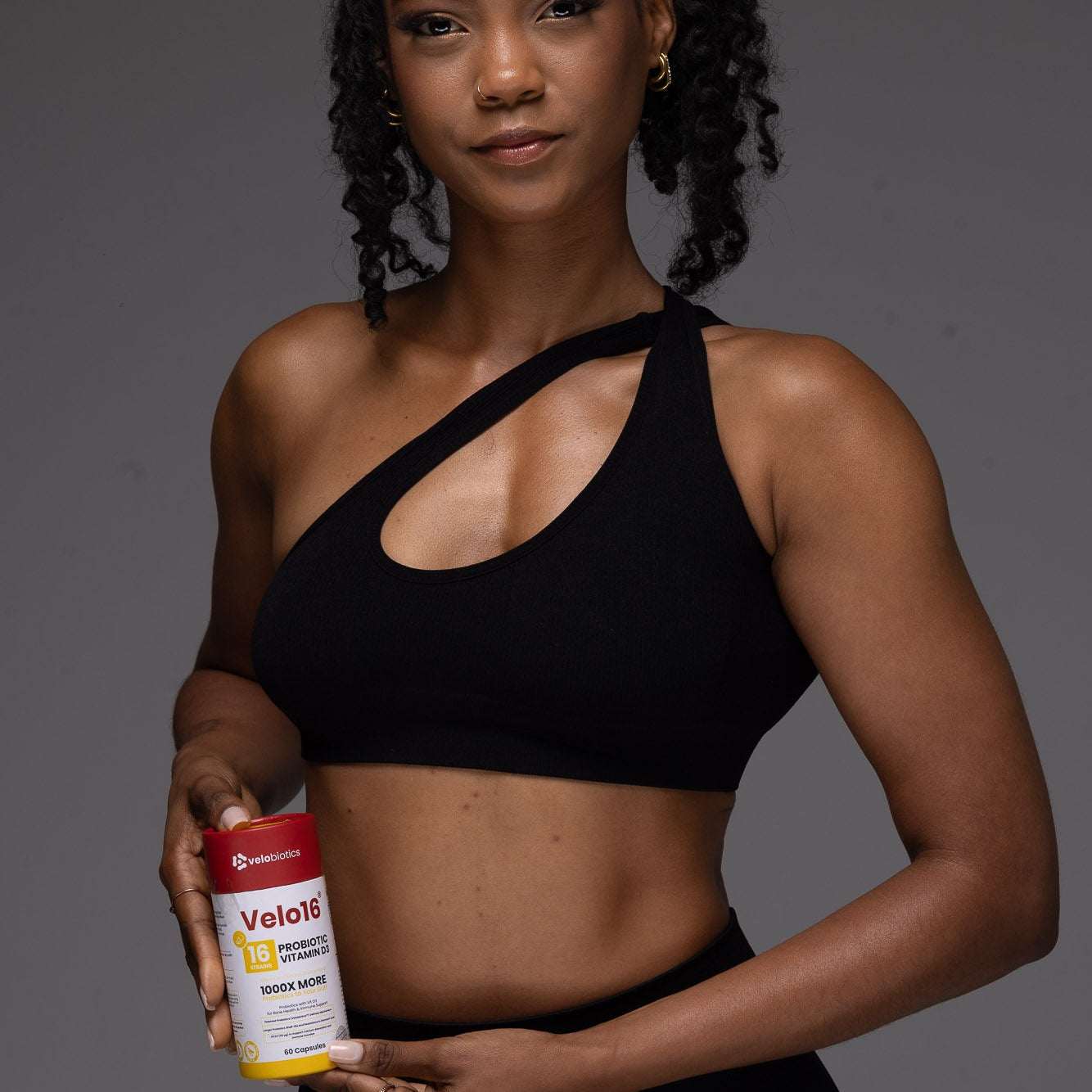 Velo16™ Probiotics + Vitamin D3 supplement bottle highlighting gut and immunity support benefits